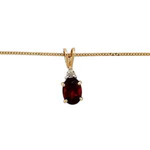 Preowned 9ct Yellow Gold Diamond & Garnet Set Pendant on a 16" fine curb chain with the weight 1.30 grams. The pendant is 1.5cm long including the bail and the garnet stone is 7mm by 5mm