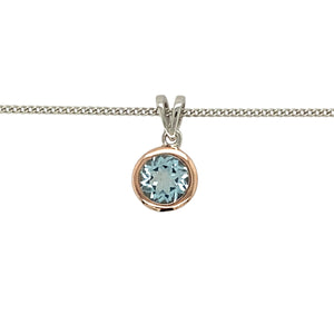 Preowned 925 Silver Clogau with 9ct Rose Clogau & Blue Topaz Set Clogau 18" Clogau curb chain with the weight 3.30 grams. The pendant is 1.5cm long including the bail and the topaz stone is 6mm diameter