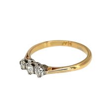 Load image into Gallery viewer, Preowned 18ct Yellow and White Gold &amp; Diamond Set Trilogy Ring in size L with the weight 1.90 grams. There is approximately 0.28ct of diamond content in total
