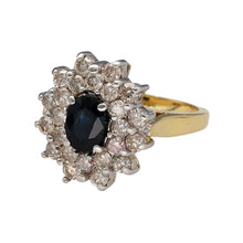 Load image into Gallery viewer, Preowned 18ct Yellow and White Gold Diamond &amp; Sapphire Set Cluster Ring in size J with the weight 8.90 grams. The sapphire stone is 7mm by 5mm and there is approximately 1ct of diamond content in total surrounding the sapphire.. The front of the ring is 16mm high
