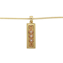 Load image into Gallery viewer, Preowned 9ct Yellow and Rose Gold &amp; Diamond Set Celtic Clogau Ingot Pendant on an 18&quot; Clogau curb chain with the weight 10.10 grams. The pendant is 3.2cm long including the bail and there is approximately 6pt of diamond content. The pendant is a limited edition
