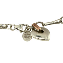 Load image into Gallery viewer, Preowned 925 Silver with 9ct Rose Gold Clogau 7&quot; Heart Bracelet with the weight 11 grams and link width 6mm. The heart is 13mm diameter and says cariad on the bail
