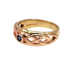 Load image into Gallery viewer, Preowned 9ct Yellow and Rose Gold &amp; Sapphire Set Clogau Celtic Style Band Ring in size M with the weight 3.90 grams. The sapphire stone is approximately 2.5mm diameter
