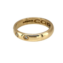 Load image into Gallery viewer, Preowned 9ct Yellow Gold &amp; Diamond Clogau Wedding Band Ring in size P with the weight 4.10 grams. The ring has three Diamonds set inside the 4mm wide band. There is cariad engraved inside the band
