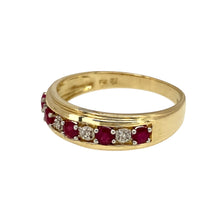 Load image into Gallery viewer, Preowned 9ct Yellow and White Gold Diamond &amp; Ruby Set Band Ring in size P with the weight 2.10 grams. The front of the band is 6mm wide and the ruby stones are each approximately 2.5mm diameter
