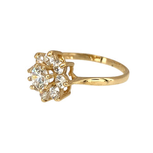 Preowned 9ct Yellow Gold & Cubic Zirconia Set Flower Cluster Ring in size K with the weight 1.60 grams. The front of the ring is 10mm high and the center stone is 4mm diameter