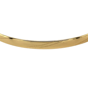 Preowned 9ct Yellow Solid Gold Patterned Bangle with the weight 6.10 grams. The bangle width is 4mm and the bangle diameter is 6.7cm