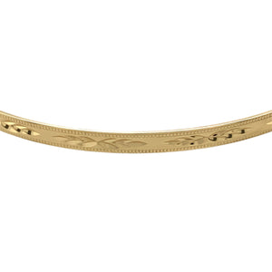 Add a timeless piece to your jewellery collection with this pre-owned 9ct yellow solid gold patterned bangle, featuring:

Design: A classic bangle with an elegant patterned finish, adding subtle detail to a versatile accessory.
Material: 9-carat yellow gold, offering a warm and enduring appeal.
Weight: A well-balanced 3.90 grams, ensuring durability while remaining lightweight.
Dimensions: 3mm wide with a 6.7cm diameter, making it ideal for everyday wear.
A refined and stylish piece, perfect for wearing alo