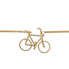 Load image into Gallery viewer, Add a unique and playful piece to your jewellery collection with this pre-owned 9ct yellow gold bicycle pendant on a 16&quot; curb chain, featuring:

Design: A finely detailed 2cm long bicycle pendant, perfect for cycling enthusiasts or those who love distinctive jewellery.
Material: 9-carat yellow gold, offering a warm and timeless appeal.
Chain: 16-inch curb chain, providing a classic and elegant fit.
Weight: A well-balanced 4.50 grams, ensuring durability while remaining comfortable to wear.
