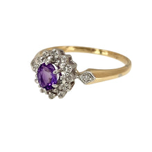 Load image into Gallery viewer, Add a touch of elegance to your jewellery collection with this pre-owned 9ct yellow and white gold diamond &amp; amethyst set cluster ring, featuring:

Design: A classic cluster ring, showcasing a rich purple amethyst surrounded by sparkling diamonds for a timeless look.
Material: 9-carat yellow and white gold, creating a striking two-tone contrast.
Gemstone: Features a 5mm by 4mm amethyst, complemented by dazzling diamond accents.
Size &amp; Weight: Designed in size M, with a lightweight yet durable 1.60 grams for
