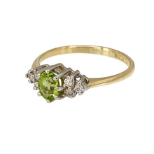 Load image into Gallery viewer, Add a fresh and elegant touch to your jewellery collection with this pre-owned 9ct yellow and white gold diamond &amp; peridot set ring, featuring:

Design: A sophisticated ring showcasing a vibrant peridot stone, enhanced by sparkling diamond accents.
Material: 9-carat yellow and white gold, creating a beautiful two-tone contrast.
Gemstone: Features a 5mm by 4mm peridot, adding a bright and eye-catching green hue.

