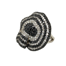 Load image into Gallery viewer, Add a bold and striking piece to your jewellery collection with this pre-owned 925 silver &amp; black and white cubic zirconia set dress ring, featuring:

Design: A statement dress ring, adorned with contrasting black and white cubic zirconia for a dramatic and elegant look.
Material: 925 sterling silver, offering a sleek and polished finish.
Gemstones: Set with black and white cubic zirconia, creating a dazzling contrast.
Size &amp; Weight: Designed in size Q, with a substantial weight of 18.50 grams, ensuring a s
