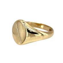 Load image into Gallery viewer, Add a bold and stylish piece to your jewellery collection with this pre-owned 9ct yellow gold patterned oval signet ring, featuring:

Design: A distinctive oval signet ring, featuring a half-patterned and half-brushed effect for a unique and contemporary look.
Material: 9-carat yellow gold, offering a warm and classic appeal.
Size &amp; Weight: Designed in size W, with a solid weight of 8 grams for a durable and comfortable fit.
Front Dimensions: Measures 15mm high, making it a bold and eye-catching statement p
