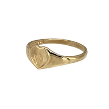 Load image into Gallery viewer, Add a charming and timeless piece to a child&#39;s jewellery collection with this pre-owned 9ct yellow gold children&#39;s patterned heart signet ring, featuring:

Design: A delicate heart-shaped signet ring, adorned with intricate patterning for added charm.
Material: 9-carat yellow gold, offering a warm and classic appeal.
Size &amp; Weight: Designed in size C, with a lightweight yet durable 0.70 grams for a comfortable fit.
Front Dimensions: Measures 6mm high, making it a dainty yet noticeable piece.

