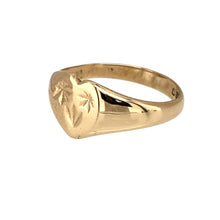 Load image into Gallery viewer, Add a delicate and charming touch to your jewellery collection with this pre-owned 9ct yellow gold flower patterned heart signet ring, featuring:

Design: A beautiful heart-shaped signet ring, adorned with an elegant flower pattern for added detail.
Material: 9-carat yellow gold, offering a warm and timeless appeal.
Size &amp; Weight: Designed in size G, with a well-balanced weight of 1.80 grams for a comfortable fit.
Front Dimensions: Measures 8mm high, making it a dainty yet noticeable piece.

