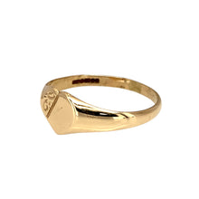 Load image into Gallery viewer, Add a delicate and charming touch to your jewellery collection with this pre-owned 9ct yellow gold patterned heart signet ring, featuring:

Design: A beautiful heart-shaped signet ring, adorned with an intricate patterned finish for added elegance.
Material: 9-carat yellow gold, offering a warm and timeless appeal.
Size &amp; Weight: Designed in size N, with a lightweight yet durable 1.30 grams for a comfortable fit.
Front Dimensions: Measures 7mm high, making it a dainty yet noticeable piece.

