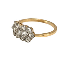 Load image into Gallery viewer, Add a touch of vintage elegance to your jewellery collection with this pre-owned 18ct yellow gold &amp; diamond set double flower Edwardian-style ring, featuring:

Design: A charming double flower motif, inspired by classic Edwardian jewellery, for a timeless and romantic look.
Material: 18-carat yellow gold, with the diamonds set in white gold to enhance their brilliance.
Gemstones: Set with sparkling diamonds, adding sophistication and vintage charm.
Size &amp; Weight: Designed in size J to K, with a well-balance
