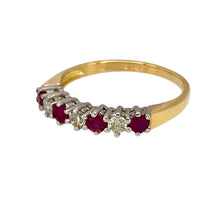 Load image into Gallery viewer, Add a touch of timeless elegance to your jewellery collection with this pre-owned 18ct yellow gold diamond &amp; ruby set band ring, featuring:

Design: A classic band ring, adorned with alternating diamonds and rubies for a refined and sophisticated look.
Material: 18-carat yellow gold, with the stones set in white gold to enhance their brilliance.
Gemstones: Features approximately 0.15ct of diamond content in total, complemented by 2mm diameter ruby stones, adding a vibrant touch of colour.

