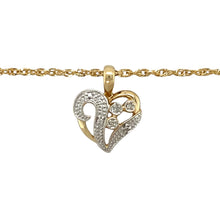 Load image into Gallery viewer, Add a touch of romance and elegance to your jewellery collection with this pre-owned 9ct yellow and white gold &amp; diamond set heart pendant necklace, featuring:

Design: A beautifully crafted heart-shaped pendant, symbolising love and timeless elegance.
Material: Made from 9-carat yellow and white gold, offering a sophisticated contrast and polished finish.
Gemstone Detail: Accented with sparkling diamonds, adding a touch of brilliance and charm.

