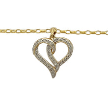 Load image into Gallery viewer, Add a touch of romance and elegance to your jewellery collection with this pre-owned 9ct yellow and white gold &amp; diamond set open heart pendant necklace, featuring:

Design: A beautifully crafted open heart pendant, symbolising love and timeless elegance.
Material: Made from 9-carat yellow and white gold, offering a sophisticated contrast and polished finish.
Gemstone Detail: Accented with sparkling diamonds, adding brilliance and charm to the design.

