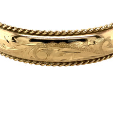 Load image into Gallery viewer, Preowned 9ct Yellow Gold Engraved Hinged Antique Style Scalloped Edge Bangle with the weight 20 grams. The bangle has a safety chain and is14mm wide. The bangle diameter is 6cm
