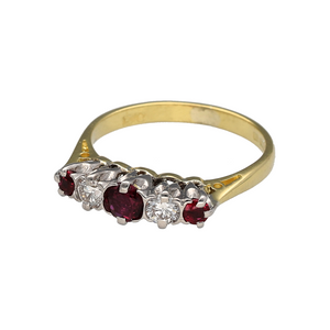 Preowned 18ct Yellow and White Gold Diamond & Ruby Set Five Stone Band Ring in size L with the weight 2.90 grams. The center ruby stone is approximately 4mm diameter