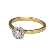 Load image into Gallery viewer, Preowned 18ct Yellow and White Gold &amp; Diamond Set Halo Solitaire Ring in size N with the weight 3.30 grams. There is approximately 25pt of diamond content in total with approximate clarity i1 and colour K - L
