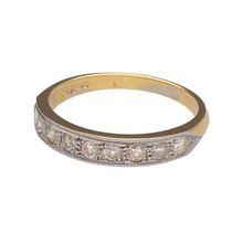 Load image into Gallery viewer, Preowned 18ct Yellow and White Gold &amp; Diamond Set Band Ring in size Q with the weight 3.20 grams. The front of the band is 4mm wide and there is approximately 36pt of diamond content in total
