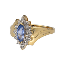 Load image into Gallery viewer, Preowned 18ct Yellow and White Gold Diamond &amp; Sapphire Set Cluster Ring in size N with the weight 3.60 grams. The tanzanite stone is 8mm by 4mm
