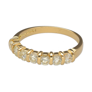 Preowned 18ct Yellow Gold & Diamond Set Band Ring in size P with the weight 3.30 grams. There are seven diamonds set in the band at approximately 1ct of diamond content in total. The diamonds are approximate clarity Si and colour M - N