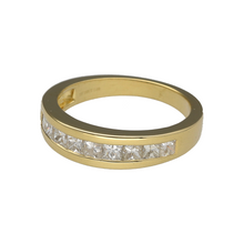 Load image into Gallery viewer, Preowned 18ct Yellow Gold &amp; Diamond Set Half Eternity Style Band Ring in size N with the weight 4.60 grams. The front of the band is 5mm wide and there is approximately 1ct of diamond content in total. There are nine princess cut diamonds
