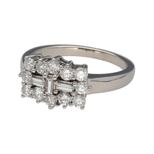 Load image into Gallery viewer, Preowned 18ct White Gold &amp; Diamond Set Cluster Ring in size O with the weight 5.60 grams. There is approximately 0.87ct of diamond content set in total in the baguette and brilliant cut diamonds. The front of the ring is 10mm high
