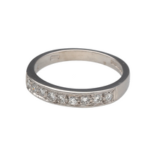 Load image into Gallery viewer, Preowned 18ct White Gold &amp; Diamond Set Band Ring in size P with the weight 4.10 grams. The front of the band is 3mm wide and there is approximately 0.27ct of diamond content in total
