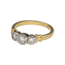 Load image into Gallery viewer, Preowned 18ct Yellow and White Gold &amp; Diamond Rubover Set Trilogy Ring in size K with the weight 3.30 grams. There is approximately 0.47ct - 0.50ct of diamond content in total with approximately clarity VS - Si and colour J - K
