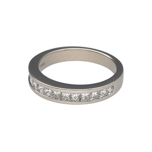 Preowned Platinum & Diamond Set Band Ring in size J to K with the weight 5.40 grams. The front of the band is approximately 3.5mm wide and there is approximately 0.78ct of diamond content set in total