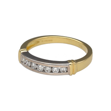 Load image into Gallery viewer, Preowned 18ct Yellow and White Gold &amp; Diamond Set Band Ring in size L with the weight 3.60 grams. There is approximately 0.21ct of diamond content in total and the front of the band is approximately 4mm wide
