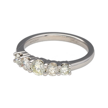 Load image into Gallery viewer, Preowned Platinum &amp; Diamond Set Five Stone Band Ring in size K to L with the weight 4.80 grams. There is approximately 0.75ct of diamond content set in total at approximate clarity Si and colour K - M
