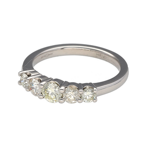 Preowned Platinum & Diamond Set Five Stone Band Ring in size K to L with the weight 4.80 grams. There is approximately 0.75ct of diamond content set in total at approximate clarity Si and colour K - M