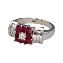 Load image into Gallery viewer, Preowned 18ct White Gold Diamond &amp; Ruby Set Dress Ring in size Q with the weight 8.90 grams. The front of the ring is 9mm high and the ruby stones are each approximately 2mm by 2mm
