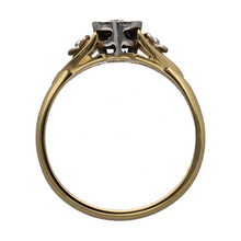 Load image into Gallery viewer, Add a romantic and elegant touch to your jewellery collection with this pre-owned 18ct yellow gold &amp; platinum diamond set heart ring, featuring:

Design: A charming heart-shaped centre, complemented by delicate flower details on the shoulders for a unique and feminine touch.
Material: 18-carat yellow gold with platinum settings, enhancing the brilliance of the diamonds.
Gemstones: Set with sparkling diamonds, adding elegance and sophistication.
