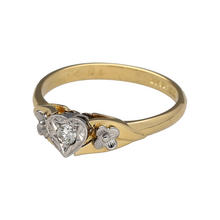 Load image into Gallery viewer, Add a romantic and elegant touch to your jewellery collection with this pre-owned 18ct yellow gold &amp; platinum diamond set heart ring, featuring:

Design: A charming heart-shaped centre, complemented by delicate flower details on the shoulders for a unique and feminine touch.
Material: 18-carat yellow gold with platinum settings, enhancing the brilliance of the diamonds.
Gemstones: Set with sparkling diamonds, adding elegance and sophistication.
