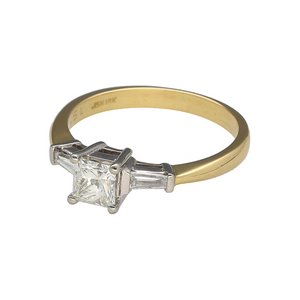 Add a timeless and sophisticated piece to your jewellery collection with this pre-owned 18ct yellow gold & diamond set solitaire ring, featuring:

Design: A classic and elegant solitaire-style ring, enhanced by side diamonds for added brilliance.
Material: Crafted in 18-carat yellow gold, with white gold settings to enhance the diamonds' sparkle.
Diamond Arrangement: Features a princess-cut diamond at the centre, flanked by two baguette-cut diamonds for a refined and balanced look.
