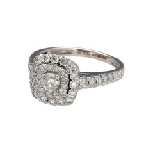 Load image into Gallery viewer, Preowned 18ct White Gold &amp; Diamond Set Halo Cluster Ring in size J to K with the weight 2.90 grams. The front of the ring is 10mm high and there is approximately 0.80ct of diamond content set in total
