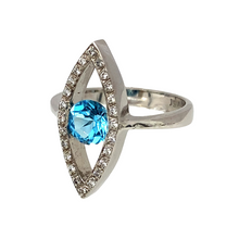 Load image into Gallery viewer, Preowned 18ct White Gold Diamond &amp; Blue Topaz Set Open Marquise Shape Dress Ring. The front of the ring is 21mm high and the blue topaz stone is 6mm diameter
