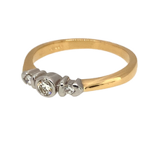 Load image into Gallery viewer, Preowned 18ct Yellow and White Gold &amp; Diamond Set Rubover Trilogy Ring in size N with the weight 3.10 grams. The center Diamond is approximately 10pt and each side stone is approximately 3pt. The Diamonds are approximate clarity VS2 and colour J - K
